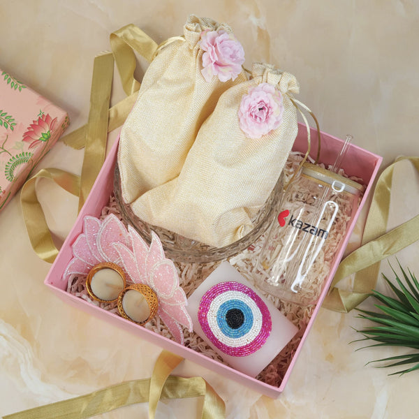 Pink Lotus Diwali Luxury Hamper with Golden Potlis, Glass Tumbler, Beaded Diyas & Evil Eye Candle