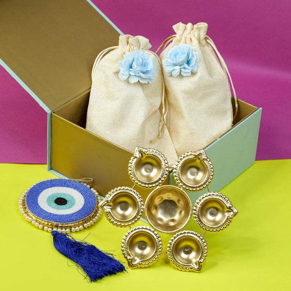 Divine Festive Diwali Hamper with Potli Bags, Brass Diya & Blue Evil Eye Charm