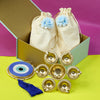 Divine Festive Diwali Hamper with Potli Bags, Brass Diya & Blue Evil Eye Charm
