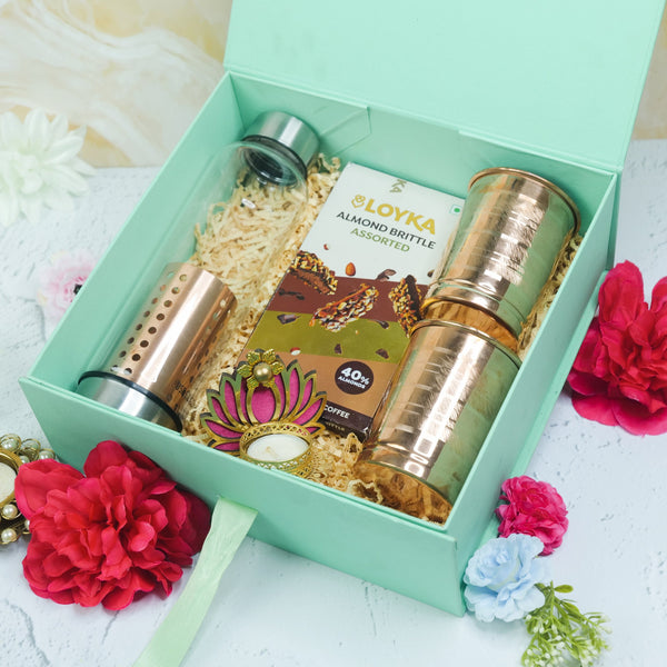 Elegant Diwali Luxury Hamper with Copper Glass, Designer Bottle, Almond Brittle & Lotus Diya